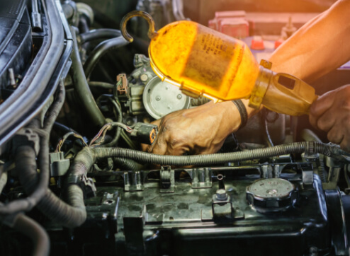 Mechanic Inspecting Car Engine
